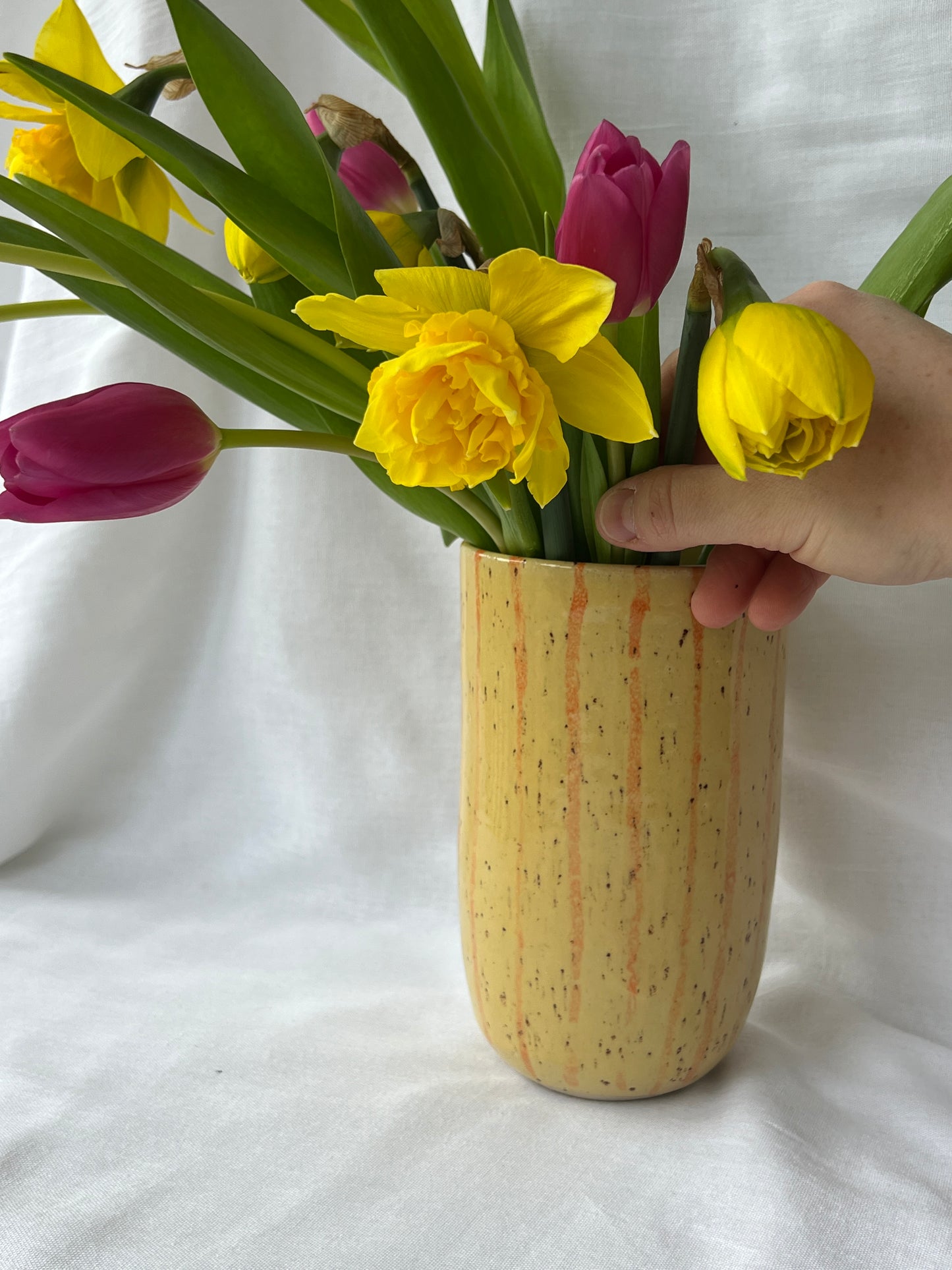 Speckled yellow and orange striped vase