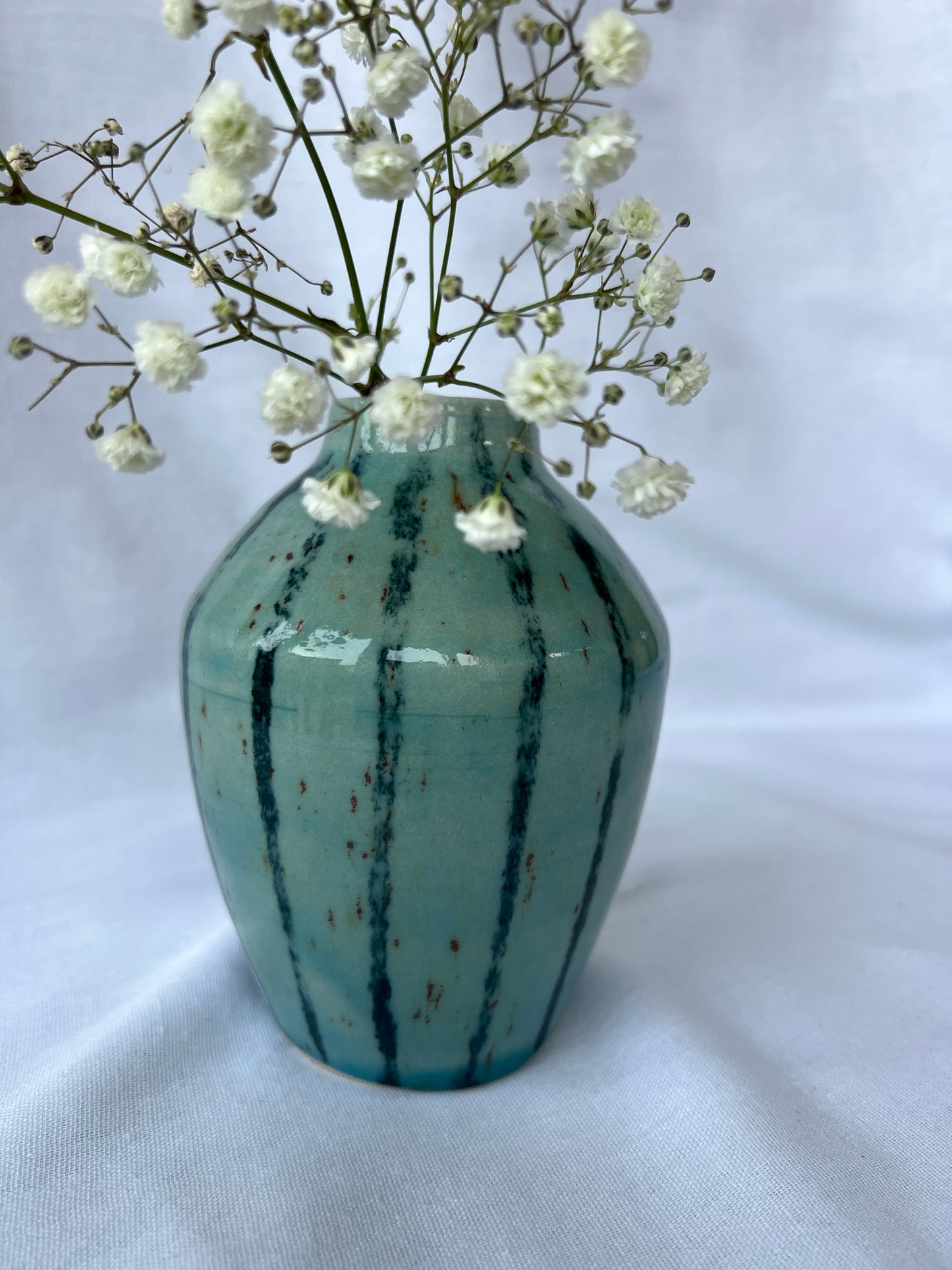 Speckled blue striped bud vase