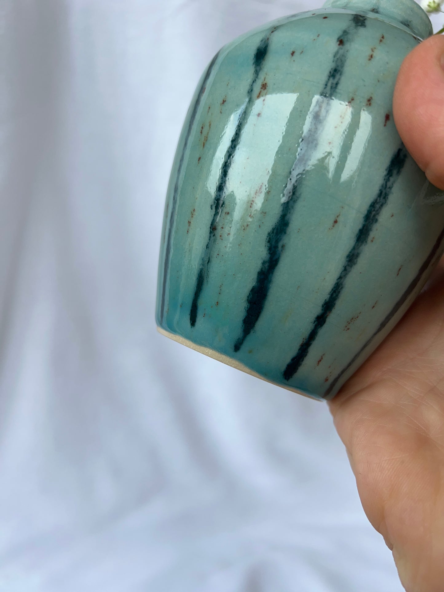 Speckled blue striped bud vase